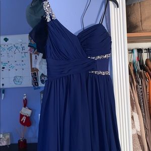 A dark blue prom dress